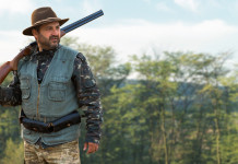 Stagione venatoria 2021/2022 e coronavirus, Federcaccia prende posizione Stagione venatoria 2021-2022 e coronavirus: cacciatore con fucile in spalla