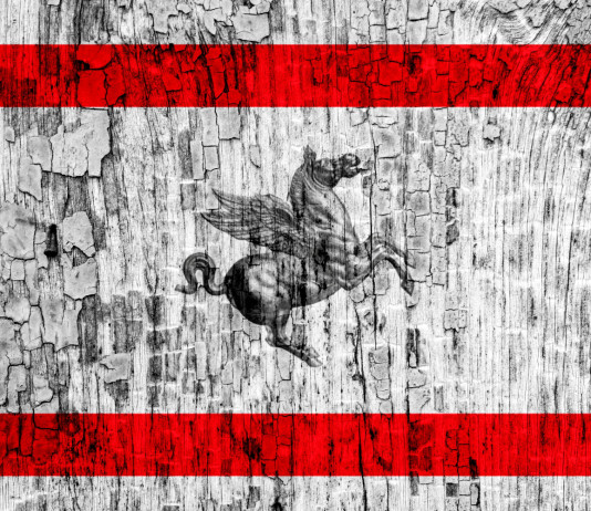 A chi la delega alla caccia in Toscana? A chi la delega alla caccia in Toscana - Pegaso, simbolo della toscana, su bandiera vintage